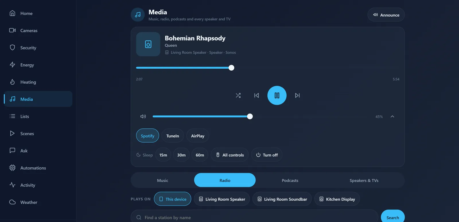 The Media screen of the SmartHome Pro app on a computer: a song playing on the living room speaker, and the speakers and TVs it can play on